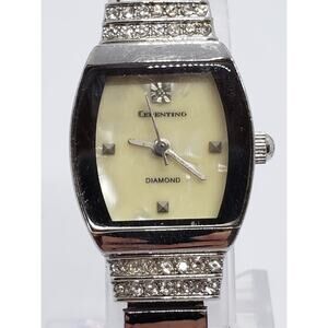 Cerentino women' watch. Cream opalescent face Jeweled clasp edges. Working watch
